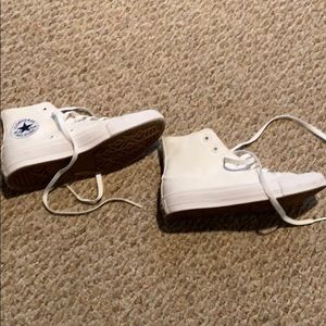 Brand new white converse high tops. Women’s 7.5